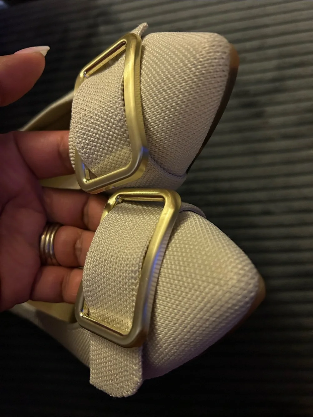 Rothy's “The Emblem Point II” pointed flats with gold hardware